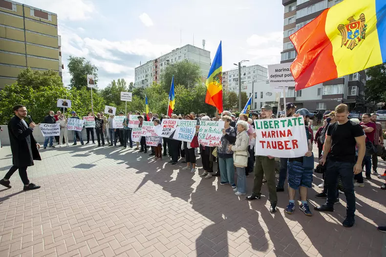 Supporters of the Shor and Communist political parties attend a protest