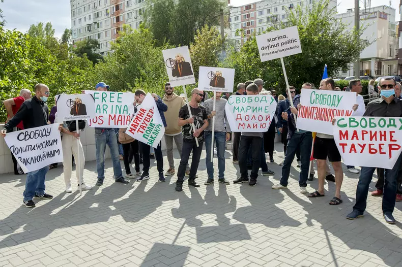 Supporters of the Shor and Communist political parties attend a protest