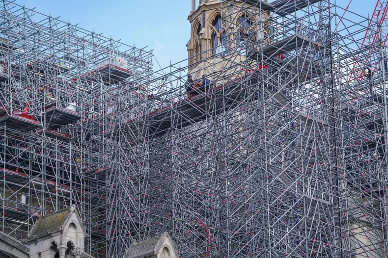 Paris, France. 7  May, 2024. Large parts of Notre Dame catheredral covered in scaffolding as the restoration continues but will not be completed in time for the  Paris Olympics. A structural fire in April 2019 caused serious damage and forced the cathedra