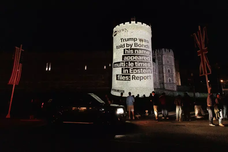 Windsor, UK. 16th September, 2025. Political campaign group Led By Donkeys project an image of a headline from ABC News onto Windsor Castle as US President Donald Trump's second state visit to the UK begins. Credit: Mark Kerrison/Alamy Live News