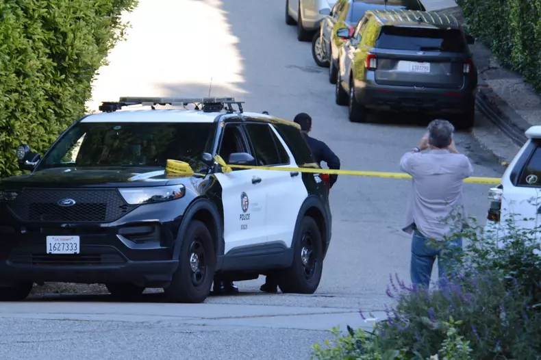 Police blocking Rihanna's street after scary shooting