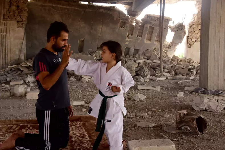 A Syrian girl's dream : becoming a champion