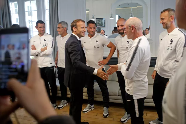 French President Emmanuel Macron meets national soccer team