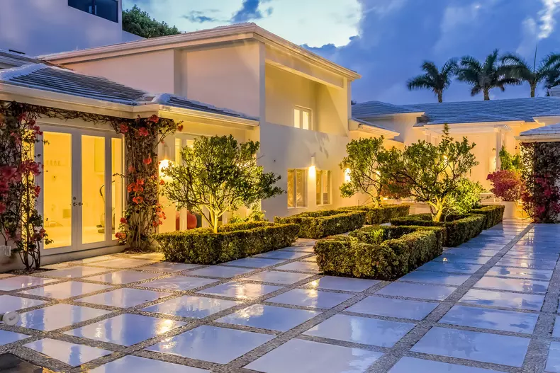 Grammy-award winning singer Shakira and her partner Barcelona star Gerald Pique have put their Miami Beach estate up for sale for $11.6 million.