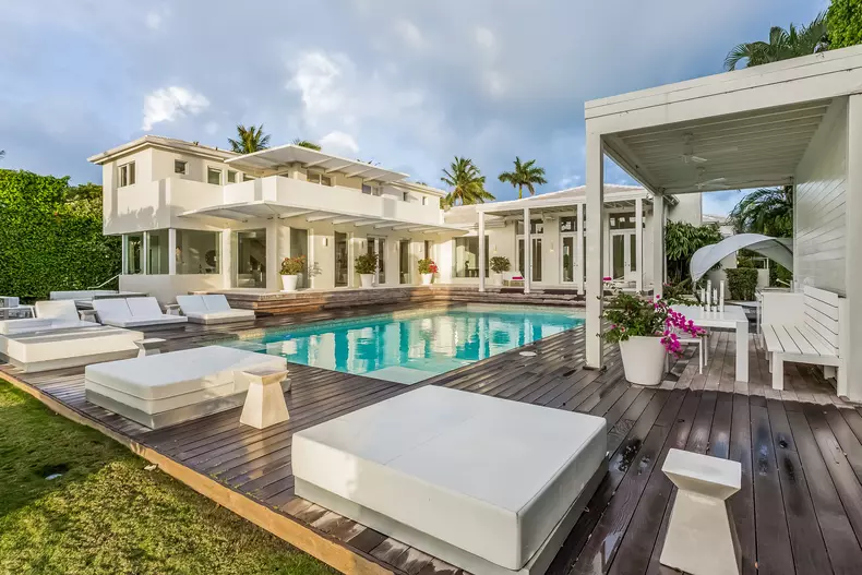 Grammy-award winning singer Shakira and her partner Barcelona star Gerald Pique have put their Miami Beach estate up for sale for $11.6 million.