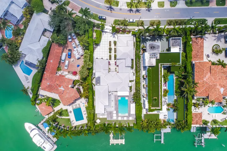 Grammy-award winning singer Shakira and her partner Barcelona star Gerald Pique have put their Miami Beach estate up for sale for $11.6 million.