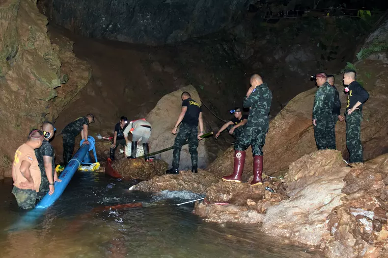 Cave search continues for members of football team missing in northern Thailand