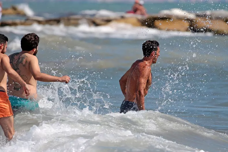 Gigi Buffon enjoying a day at the beach with friends