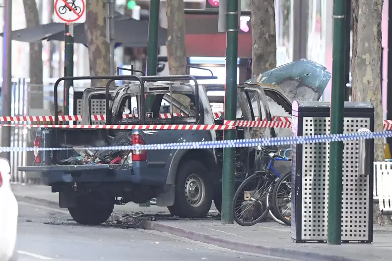 Man sets vehicle on fire and stabbs two in Melbourne