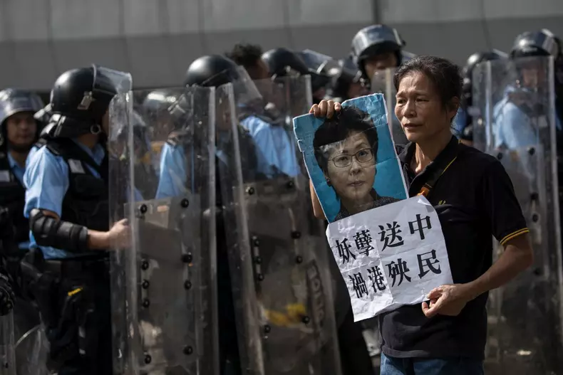 Anti-extradition protesters block roads near the Legislative Council