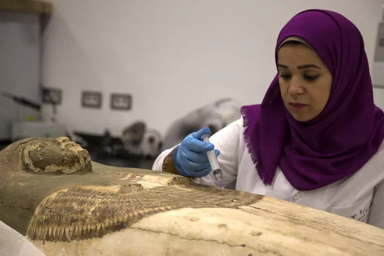 Gilded coffin of King Tutankhamun restoration process