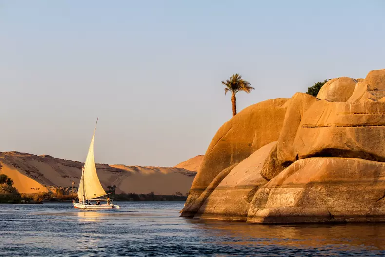 Sailboat,On,The,Nile,River,At,Sunset,,Rock,With,Ancient