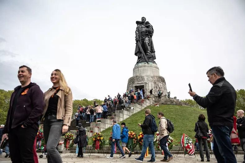Berlin, Germany - People commemorate Victory Day at the Soviet War Memorial in Treptower Park in Berlin , on May 9, 2019