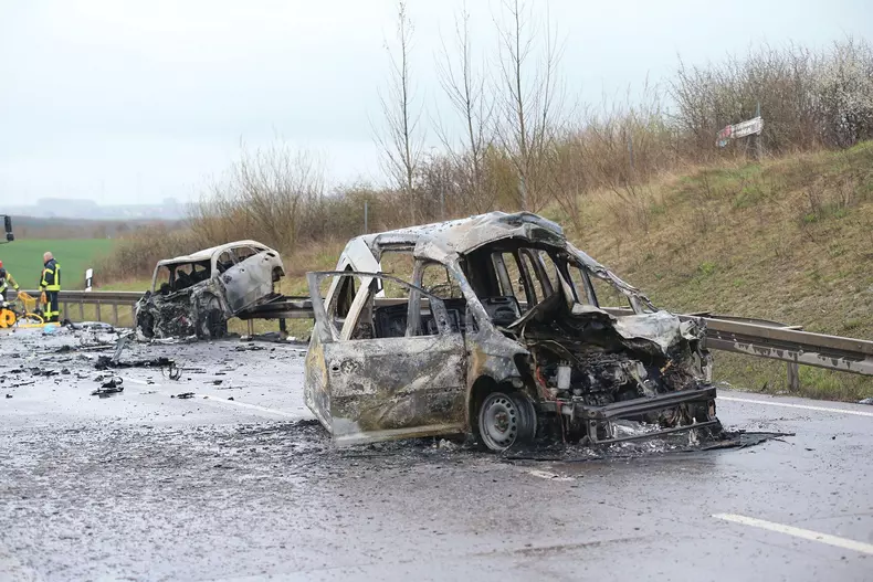 Bad Langensalza, Germany. 01st Apr, 2023. Two burnt-out cars stand at the scene of the accident on the B247 near Bad Langensalza. According to police, several people were killed in a serious traffic accident in northern Thuringia late on Saturday afternoo
