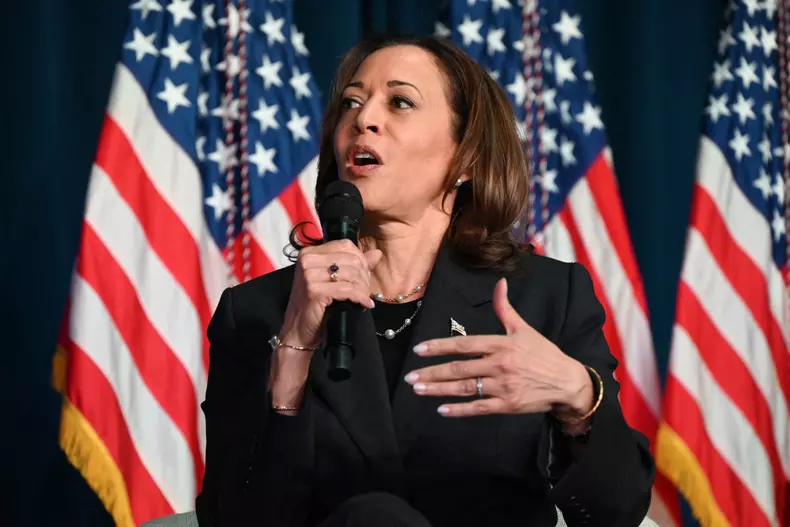 VP Kamala Harris talks in discussion with Olivia Troye and Amanda Stratton