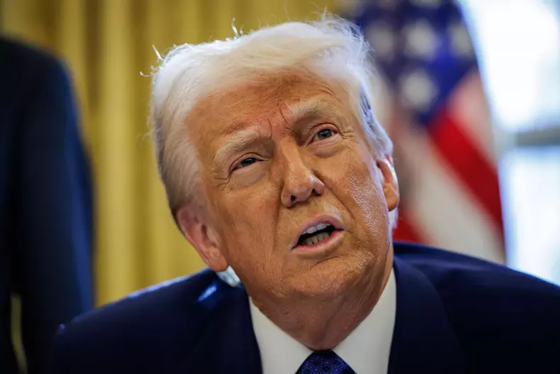 DC: U.S. President Trump Signs Executive Orders in the Oval Office