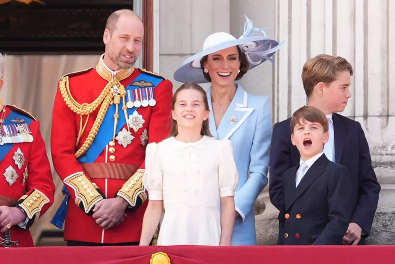 Members of the Royal Family (left to right) Queen Camilla, King Charles III, the Prince of Wales, Princess Charlotte, the Princess of Wales, Prince George, and Prince Louis on the balcony of Buckingham Palace, London, to view the flypast following, the Tr
