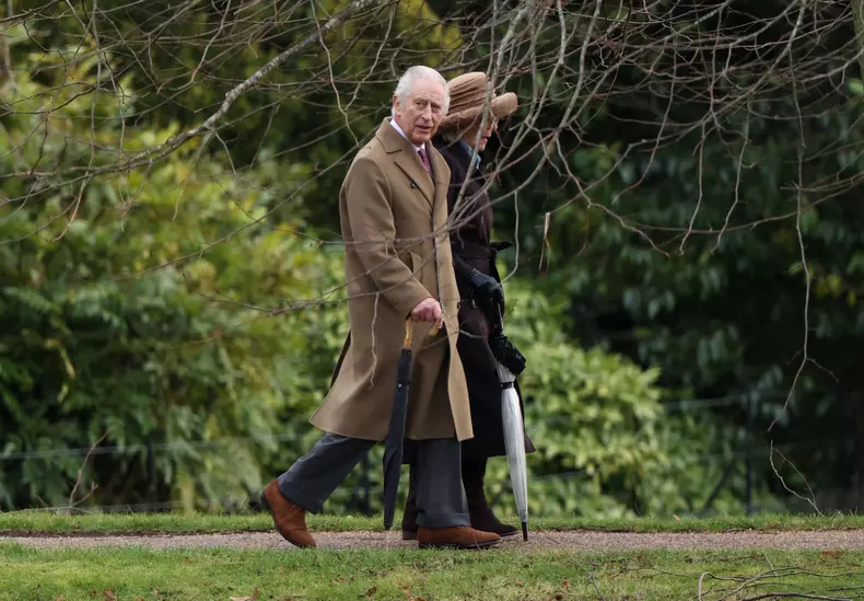 King Charles III and Queen Camilla walking to the Sunday Holy Communion service at St. Mary Magdalene church in Sandring