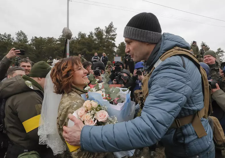 Ukrainian territorial defense fighters tie the knot amid Russian military operation