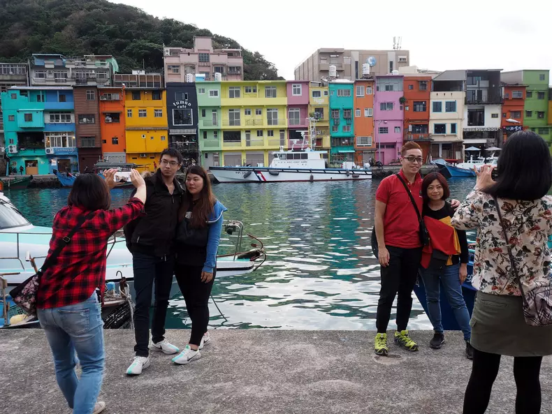 Artists paint Taiwan fishing port into tourist attraction