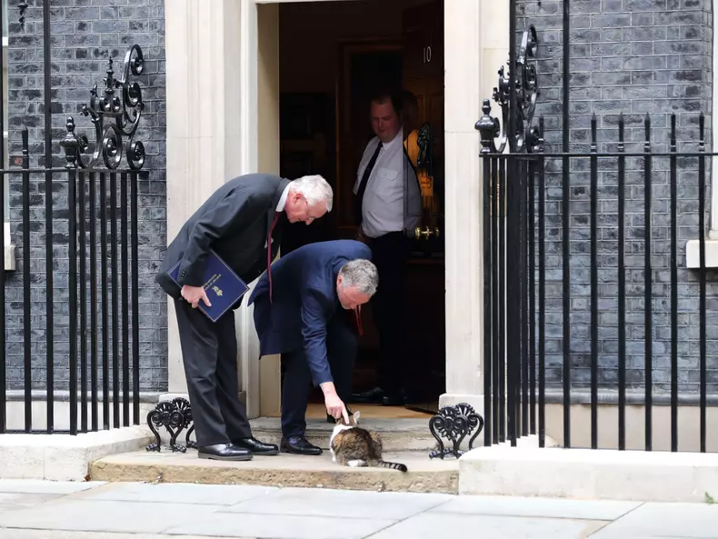 London, United Kingdom,  16 July 2024. Larry the Cat gets some attention from Hilary Benn, Secretary of State for Northern Ireland and Steve Reed, Secretary of State for Environment, Food and Rural Affairs  after the  Cabinet Meeting. Credit: Uwe Deffner/