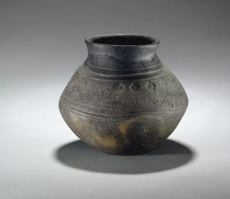 Pottery cremation urn, from a grave at Loveden Hill, Lincolnshire, Anglo-Saxon, 6th-7th century.