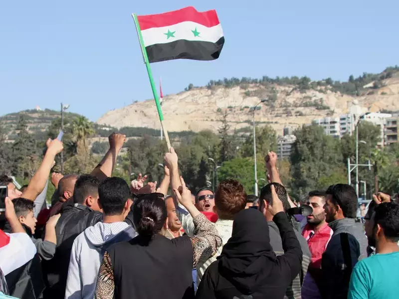 Protest in Damascus after US and allies launched strikes on Syria