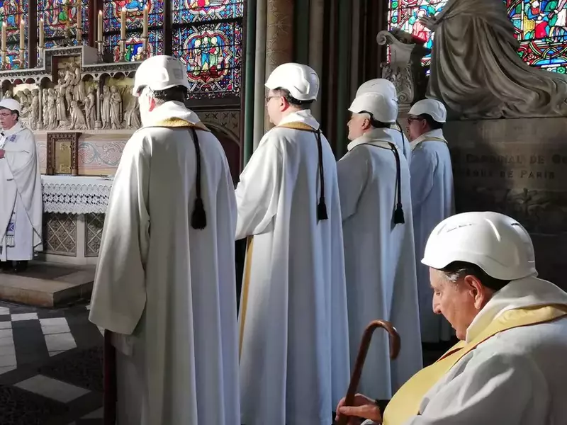 First mass in side chapel of Notre-Dame de Paris after fire