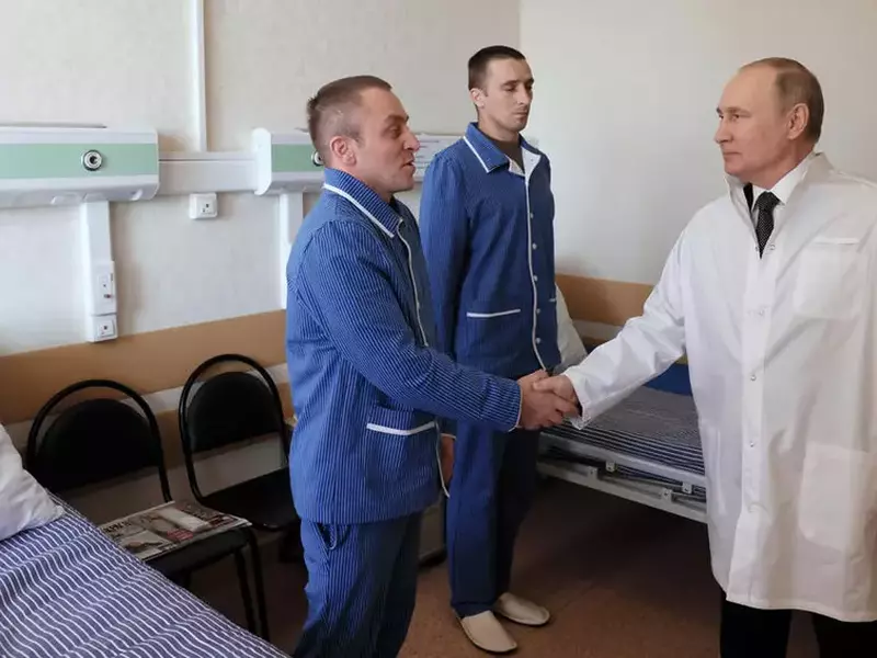 Russian President Putin visits a military hospital