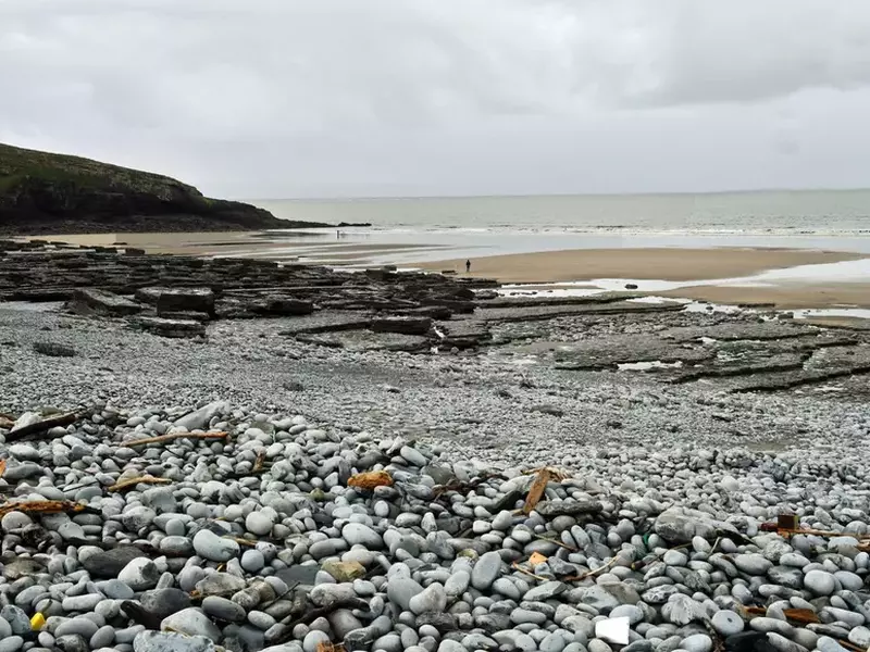 A view of Dunraven Bay on the Glamorgan Heritage Coast in South Wales on a rather cold and greyish day in November with just a few folk out for a walk.