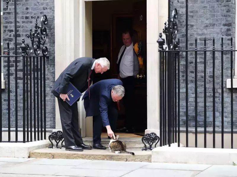 London, United Kingdom,  16 July 2024. Larry the Cat gets some attention from Hilary Benn, Secretary of State for Northern Ireland and Steve Reed, Secretary of State for Environment, Food and Rural Affairs  after the  Cabinet Meeting. Credit: Uwe Deffner/