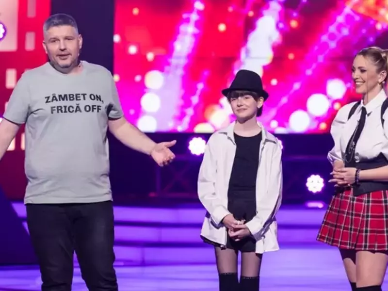 Cătălin Neamți (stânga) și Florina Constantinescu (dreapta) la „Vedeta familiei”, emisiune difuzată de TVR