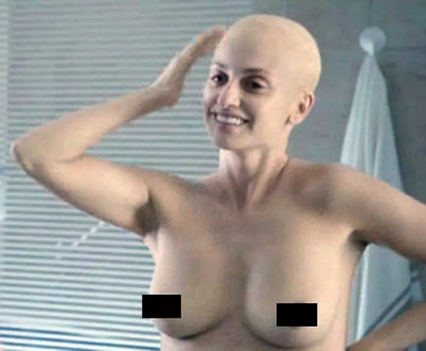 CRUZ IN DRAMATIC CANCER  MOVIE MA MAnnPenelope Cruz is the wellspring of all womanly virtues in ¿Ma ma,nnNervously waiting a few months after finding a lump in one breast, Magda (Cruz) finally drags herself to see her gynecologist, Julian (Asier Etxeandia), who soon delivers the bad news: She will need a mastectomy, preceded by debilitating chemo treatments. She ponders this ill fortune at a soccer game where her son Dani (Teo Planell) excels as usual, attracting the attention of talent scout Arturo (Luis Tosar), who¿s looking for talented young players to enroll in the junior leagues that could lead to a pro career. ¿I needed some good news today,¿ Magda tells her new acquaintance, but just then Arturo gets a call with the worst news imaginable: There¿s been a car accident, one that¿s killed his daughter and left his wife in a coma.nMagda takes the distraught man to the hospital, then continues visiting him there after her own subsequent radiation therapies ¿ which she¿s informed no one else about, her self-absorbed academic husband, Raul (Alex Brendemuhl), having recently abandoned the family for an affair with a student.nnThe movie was released in Spain at the end of 2015 but will be released throught the world later this year, 2016.nPicture shows:  A shaven-haired Penelope smiles into the mirror before her mastectomy operation.nn75596nEDITORIAL USE ONLY