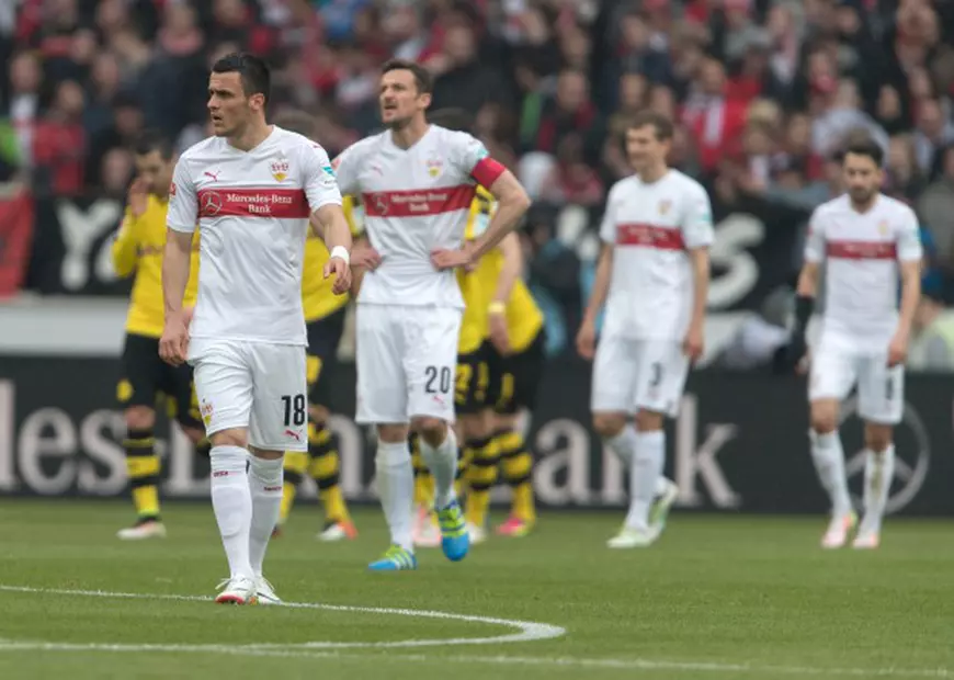 epa05273657 Stuttgart's Filip Kostic (l) and Christian Gentner during the German Bundesliga soccer match between VfB Stuttgart and Borussia Dortmund at Mercedes-Benz Arena in Stuttgart, Germany, 23 April 2016. (EMBARGO CONDITIONS - ATTENTION: Due to the accreditation guidlines, the DFL only permits the publication and utilisation of up to 15 pictures per match on the internet and in online media during the match.) EPA/DANIEL MAURER