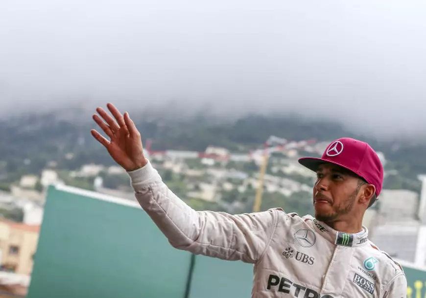 epa05336053 British Formula One driver Lewis Hamilton of Mercedes AMG GP celebrates winning the 2016 Formula One Grand Prix of Monaco at Monte Carlo circuit in Monaco, 29 May 2016. EPA/SRDJAN SUKI