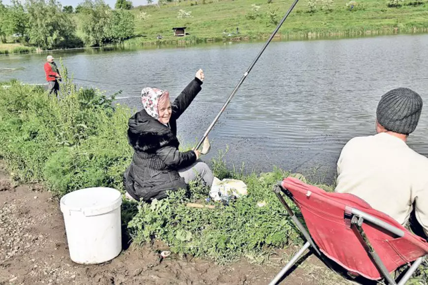 Soţii Manea merg împreună la pescuit