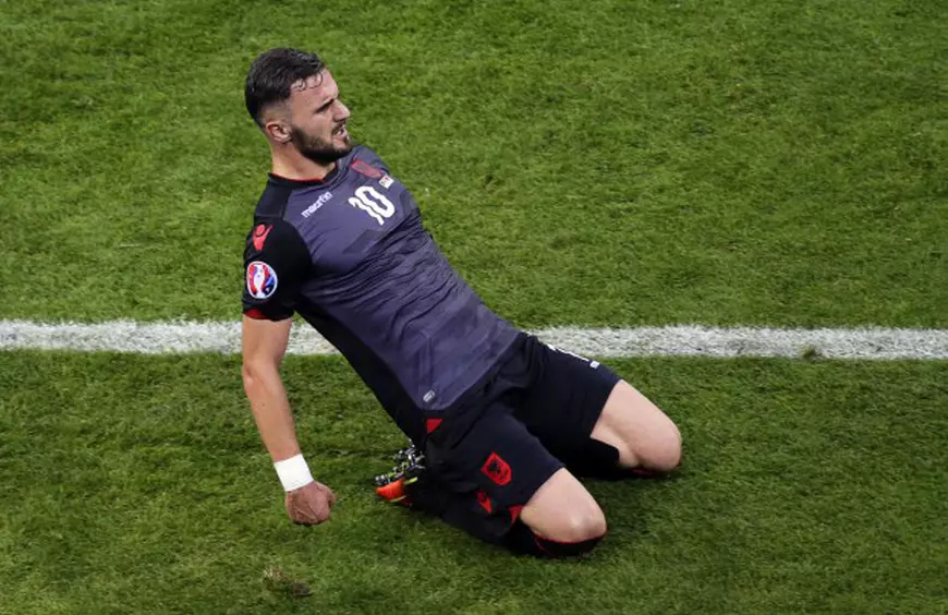 epa05378029 Armando Sadiku of Albania celebrates after scoring the 1-0 lead during the UEFA EURO 2016 group A preliminary round match between Romania and Albania at Stade de Lyon in Lyon, France, 19 June 2016. (RESTRICTIONS APPLY: For editorial news reporting purposes only. Not used for commercial or marketing purposes without prior written approval of UEFA. Images must appear as still images and must not emulate match action video footage. Photographs published in online publications (whether via the Internet or otherwise) shall have an interval of at least 20 seconds between the posting.) EPA/MAST IRHAM EDITORIAL USE ONLY
