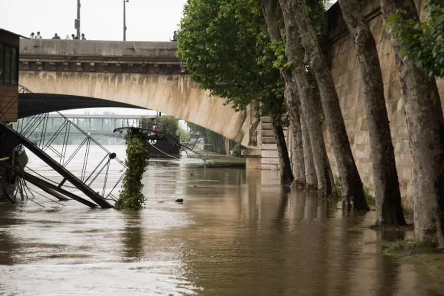After the most ever rainy month of may, the level of Seine River keep on growing on June 1, 2016 in Paris, France. The feet of the Zouave statue on the Pont de l'Alma, considered an indicator of the level of the Seine, are covered by the rising waters. When his feet are under water, emergency flood precautions are taken. Photo by Christophe Geyres/ABACAPRESS.COM