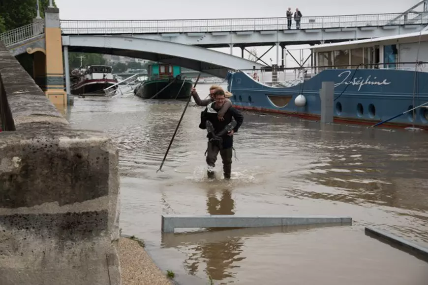 After the most ever rainy month of may, the level of Seine River keep on growing on June 1, 2016 in Paris, France. The feet of the Zouave statue on the Pont de l'Alma, considered an indicator of the level of the Seine, are covered by the rising waters. When his feet are under water, emergency flood precautions are taken. Photo by Christophe Geyres/ABACAPRESS.COM