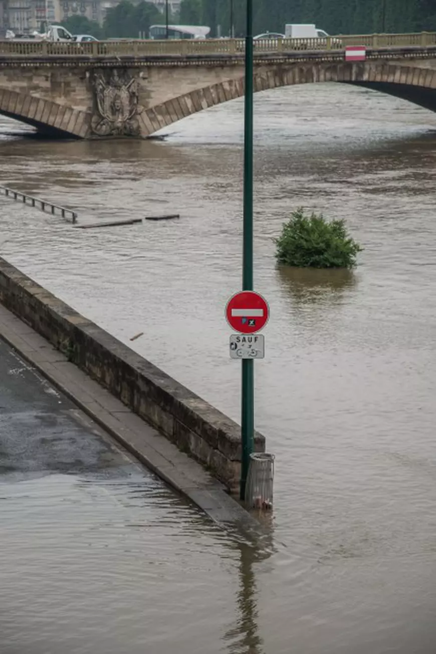 After the most ever rainy month of may, the level of Seine River keep on growing on June 1, 2016 in Paris, France. The feet of the Zouave statue on the Pont de l'Alma, considered an indicator of the level of the Seine, are covered by the rising waters. When his feet are under water, emergency flood precautions are taken. Photo by Christophe Geyres/ABACAPRESS.COM