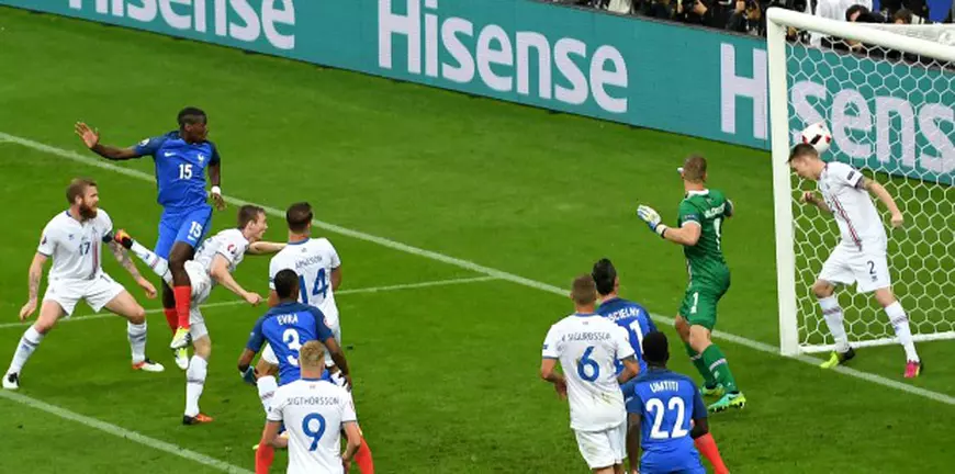 epa05406116 Paul Pogba (2-L) of France scores the 2-0 goal during the UEFA EURO 2016 quarter final match between France and Iceland at Stade de France in Saint-Denis, France, 03 July 2016. (RESTRICTIONS APPLY: For editorial news reporting purposes only. Not used for commercial or marketing purposes without prior written approval of UEFA. Images must appear as still images and must not emulate match action video footage. Photographs published in online publications (whether via the Internet or otherwise) shall have an interval of at least 20 seconds between the posting.) EPA/GEORGI LICOVSKI EDITORIAL USE ONLY