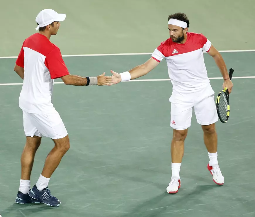 Florin Mergea (R) and Horia Tecau (L) of Romania play Rafael Nadal and Marc Lopez of Spain during their Rio 2016 Olympic Games Men's Gold Medal Doubles match at the Olympic Tennis Centre in the Olympic Park in Rio de Janeiro, Brazil, 12 August 2016. EPA/MICHAEL REYNOLDS
