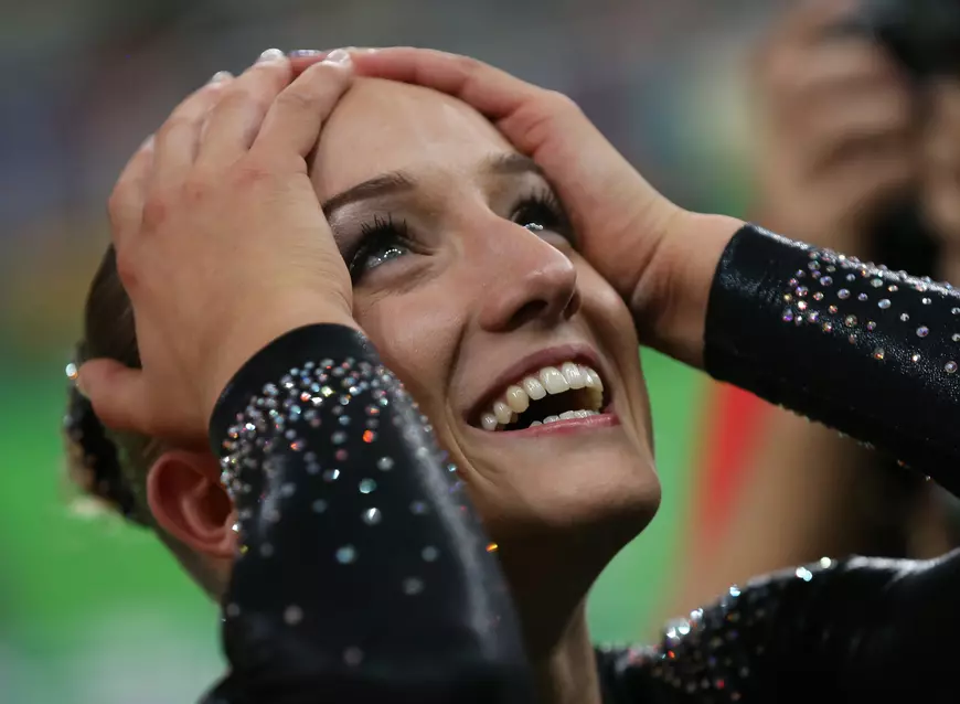 epa05487583 Sanne Wevers of the Netherlands reacts after competing in the women's Balance Beam final for the Rio 2016 Olympic Games Artistic Gymnastics events at the Rio Olympic Arena in Barra da Tijuca, Rio de Janeiro, Brazil, 15 August 2016. EPA/HOW HWEE YOUNG