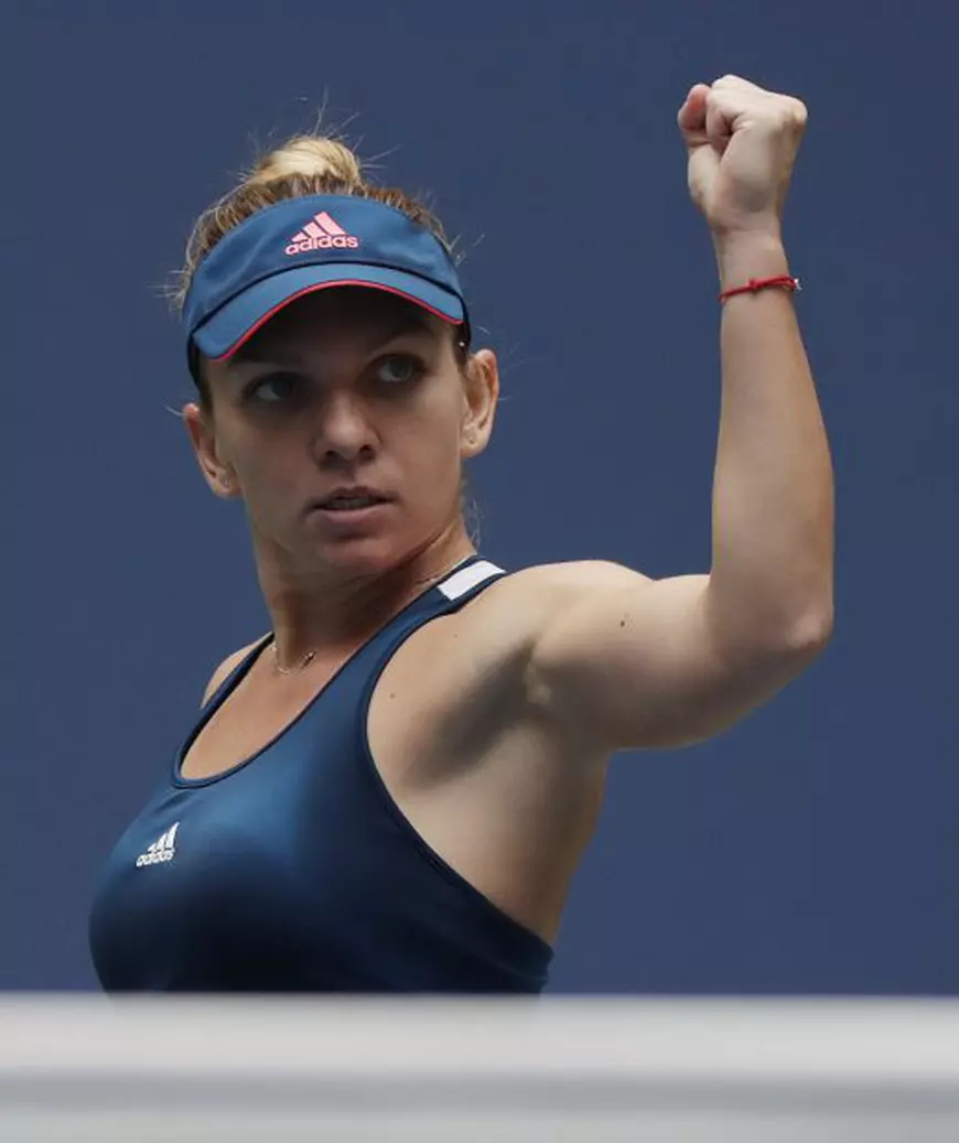 Simona Halep, reacţionând după un game câştigat în setul decisiv al meciului cu Timea Babos de la US Open 2016. (FOTO: EPA)