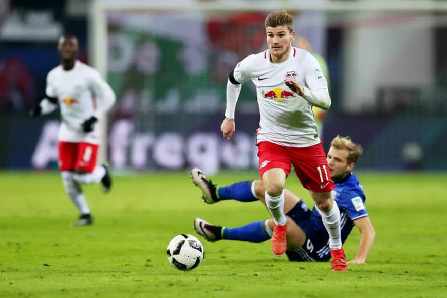 epa05658425 Leipzig's Timo Werner (front) in action during the German Bundesliga soccer match between RasenBallsport Leipzig and FC Schalke 04 in Leipzig, Germany, 03 December 2016. EPA/JAN WOITAS (EMBARGO CONDITIONS - ATTENTION: Due to the accreditation guidelines, the DFL only permits the publication and utilisation of up to 15 pictures per match on the internet and in online media during the match.)