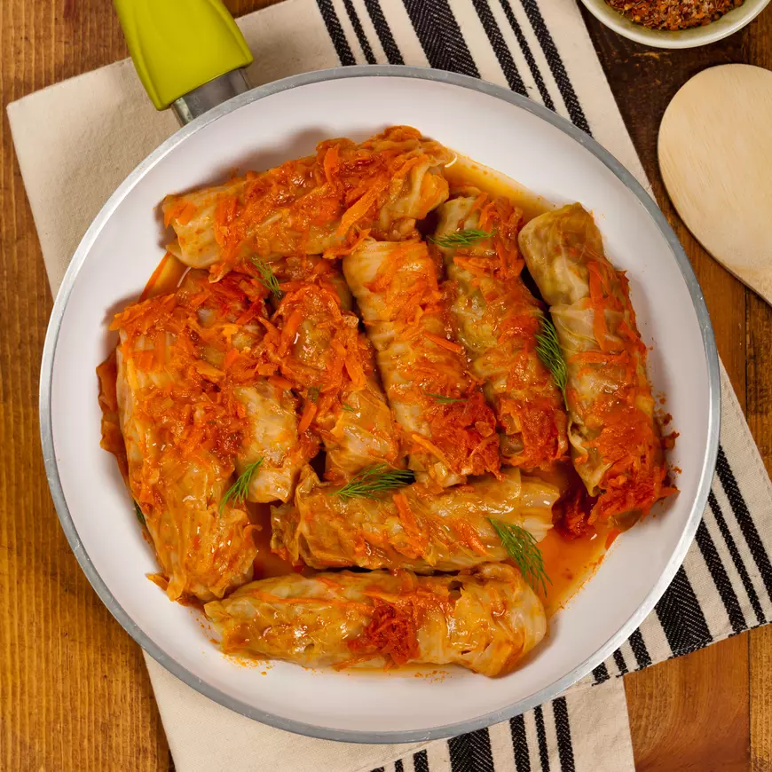 57769123 - stuffed cabbage with tomato sauce. selective focus.