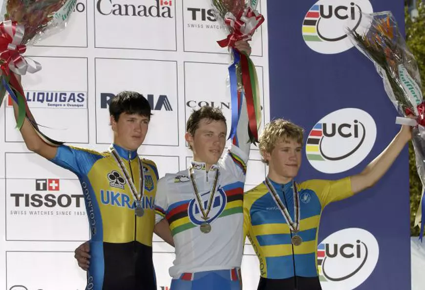 The top three finishers in the Junior Men Time Trial, at the 2003 Road World Cycling Championships in Hamilton, Canada on Wednesday,  08 October 2003.   From left: second placed Dmytro Grabovskyy of the Ukraine,  first placed Mikhail Ignatiev of Russia, and third placed Viktor Renang of Sweden. Warren Toda  EPA/Warren Toda