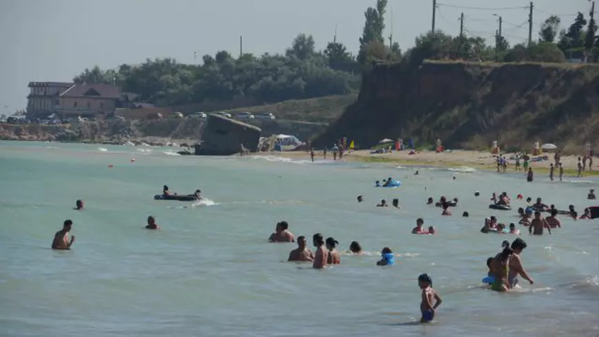 REPORTAJ. 2 Mai, ultima plajă bastion a familiei tradiționale de pe litoralul românesc / GALERIE FOTO