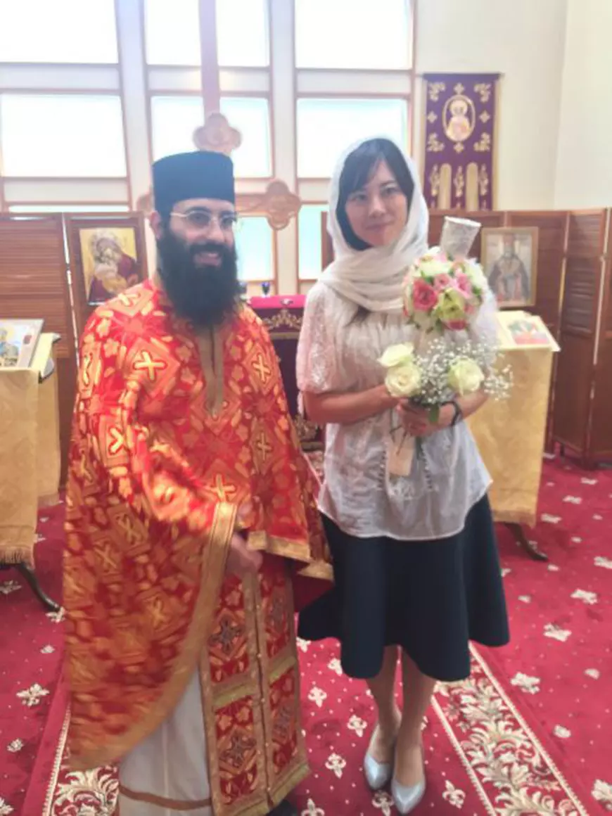 O japoneză s-a botezat ortodox și s-a căsătorit cu un român care lucrează ca architect în Japonia. 