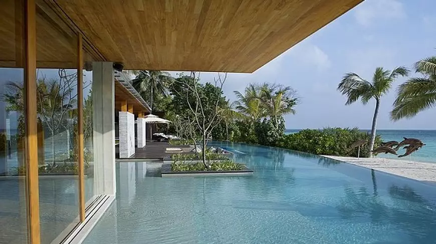 FOTO/ Insula privată destinată regilor, starurilor şi miliardarilor: o noapte de cazare costă cât salariul mediu al unui român pe cinci ani